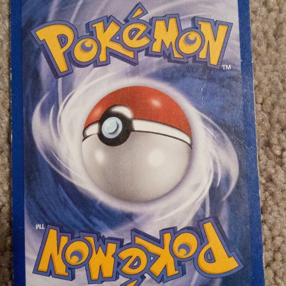 1st Edition Team Rocket Squirtle - Picture 2 of 2